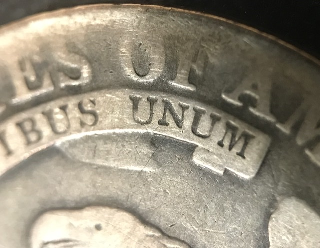 Capped-Bust-Half-Dollar-With-Strange-Die-Mark.-What-May-Have-Caused-This?